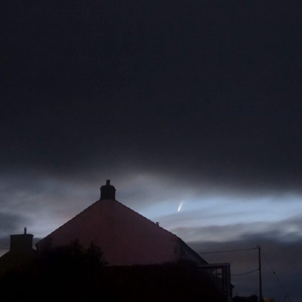 The Comet Neowise passing through the sky above Wigtown rooftops.