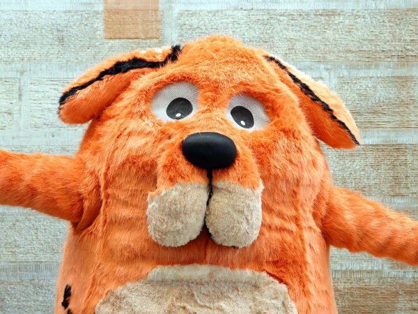 The Big Dog mascot, a large and fluffy orange dog, from the children's book festival in Dumfries.