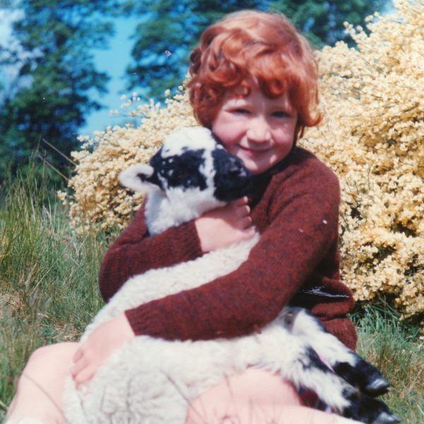 Polly with Lulu her first pet lamb